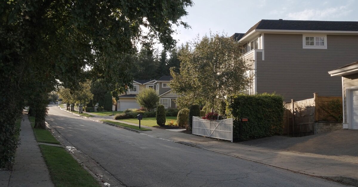 Bellevue Washington residential street with mature trees and Pacific Northwest homes