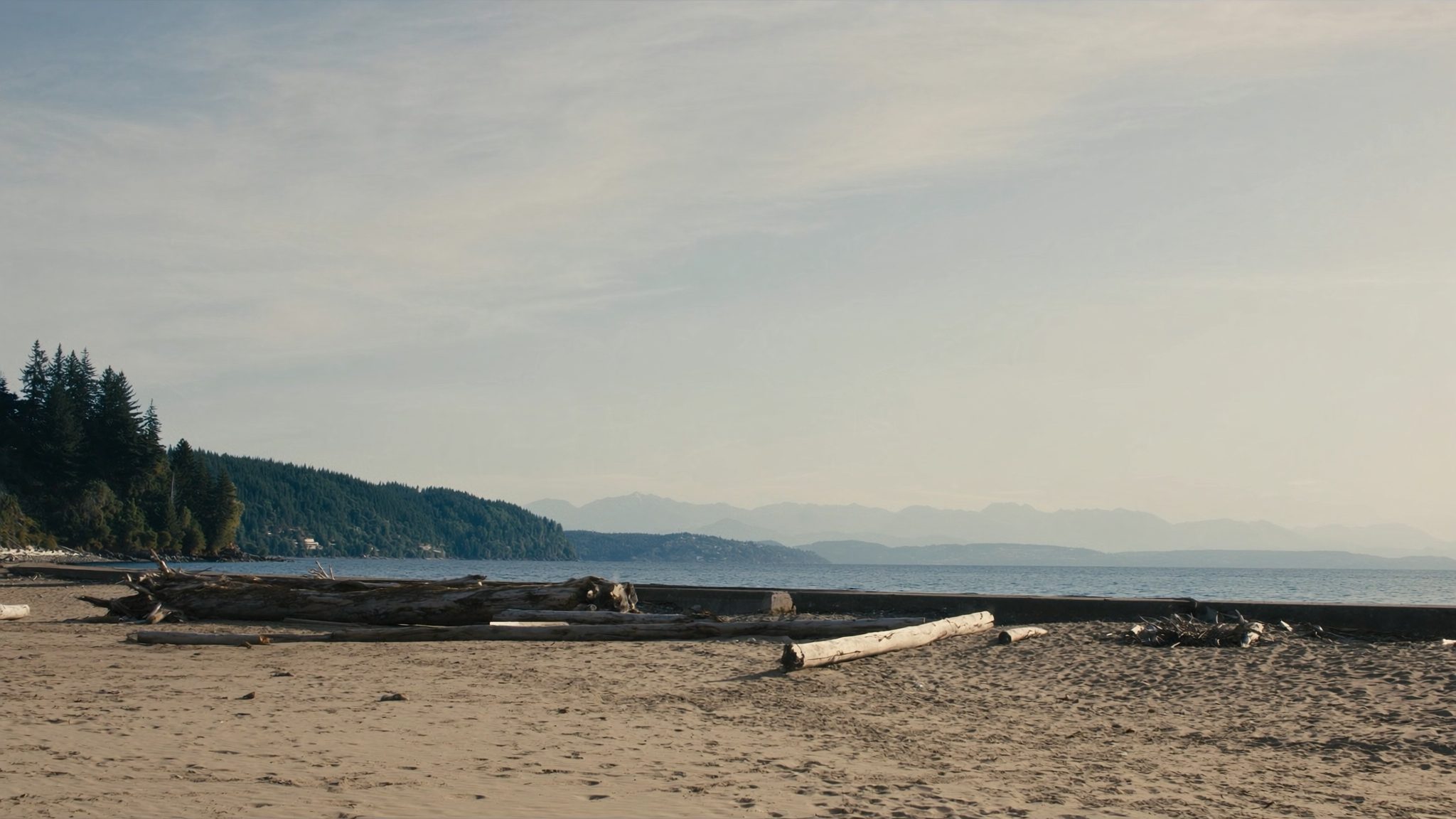 Dash Point State Park beach in Federal Way Washington with Puget Sound and Olympic Mountains view