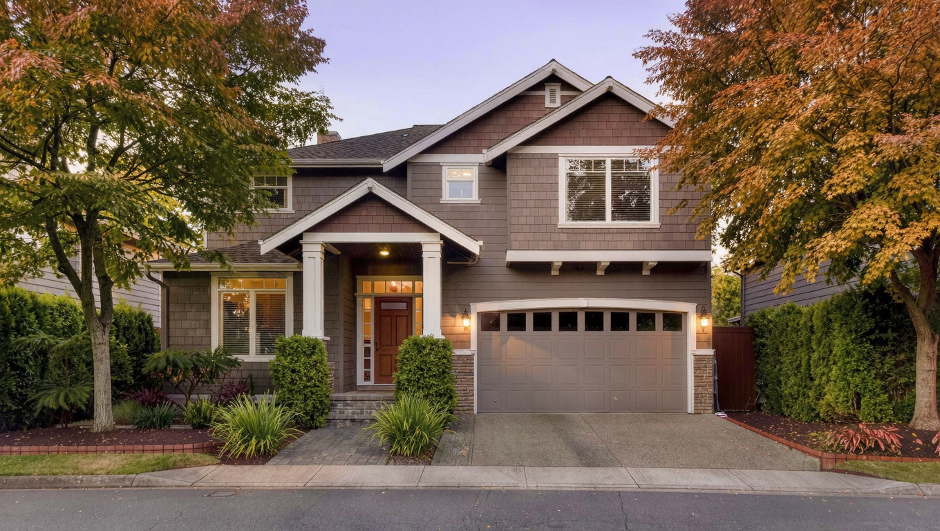 Two-story home with manicured landscaping on a cul-de-sac street in the Lakeland Hills neighborhood of Auburn, Washington