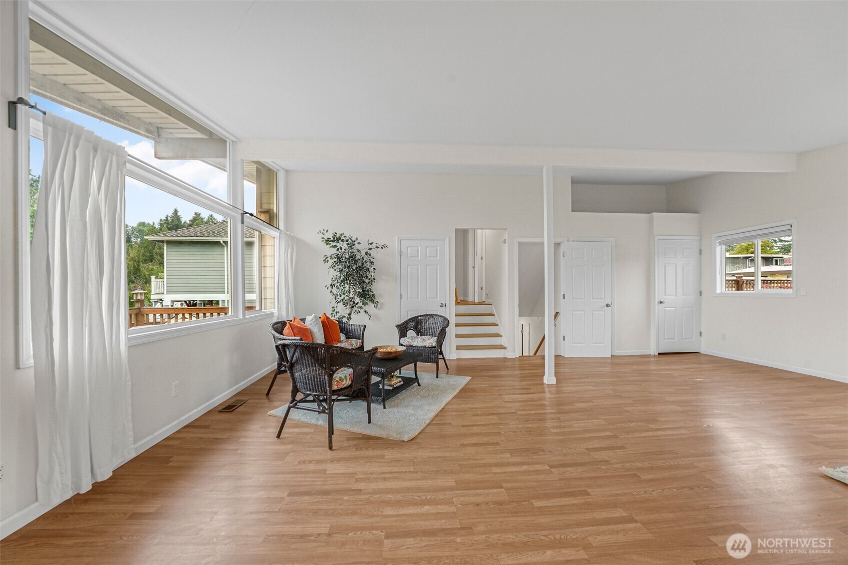 Living area with stairs to the upper level