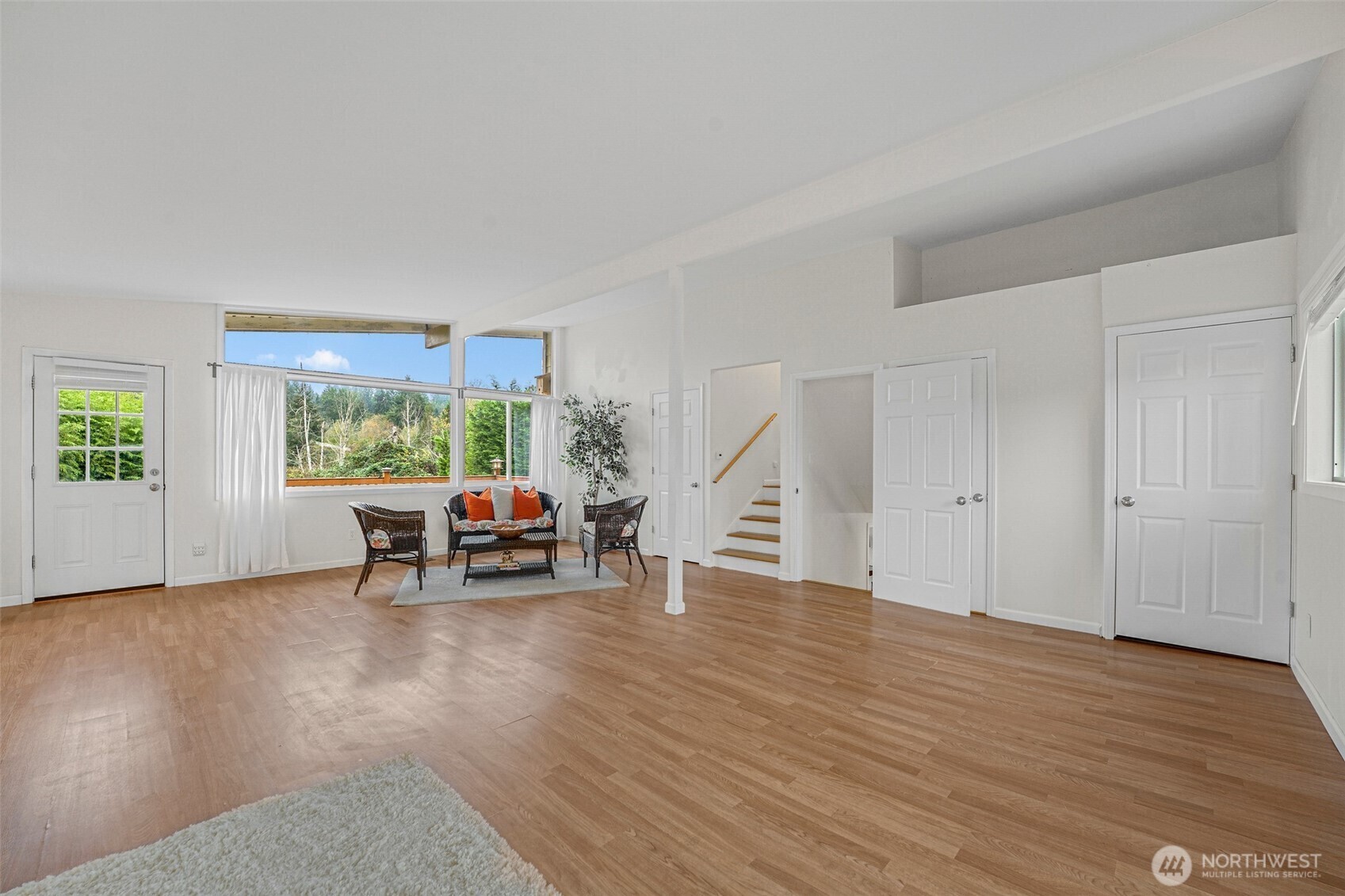 Family room with windows to the yard