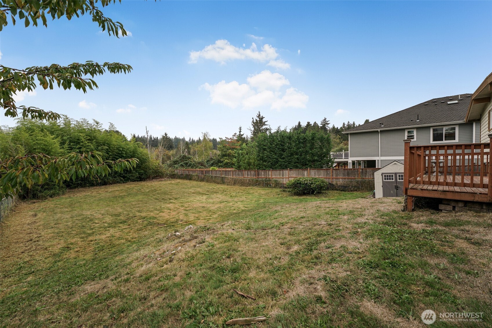 Fenced backyard and back deck