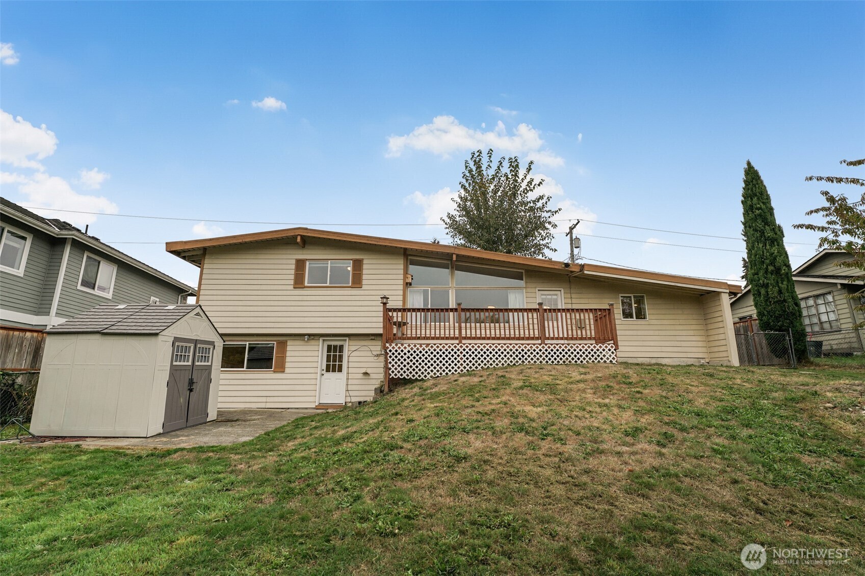 Back of the home with the south-facing deck