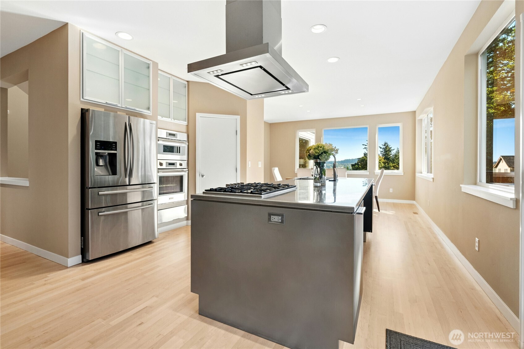 Kitchen island and built-in ovens