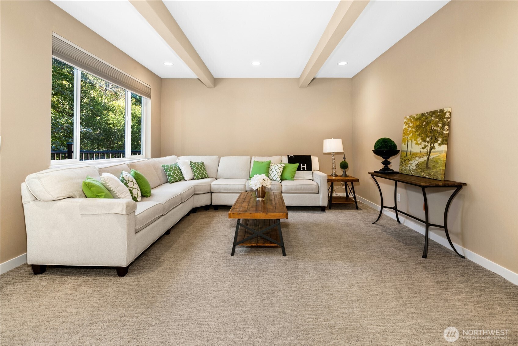 Family room with beamed ceiling