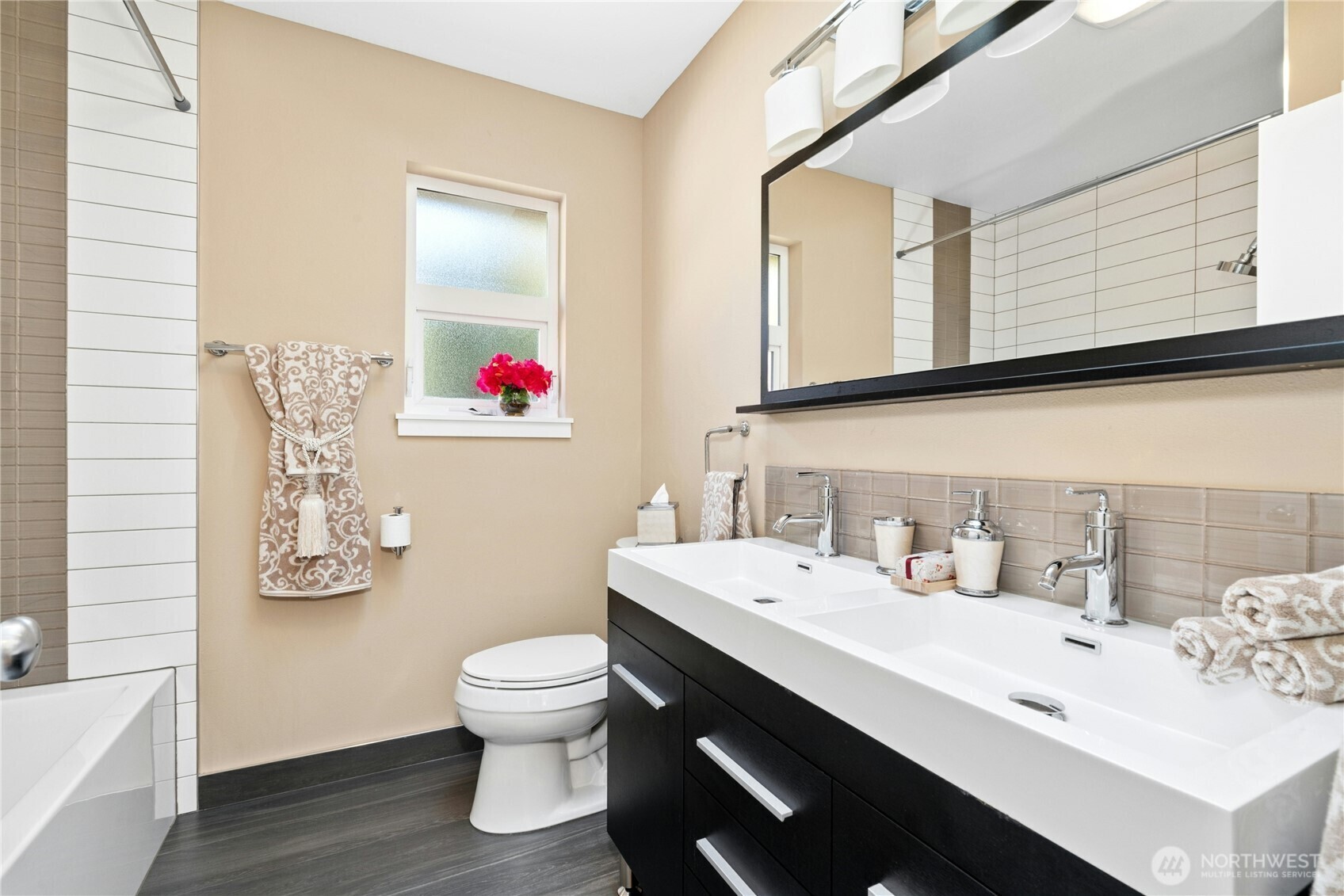 Upper-level bathroom with double sinks