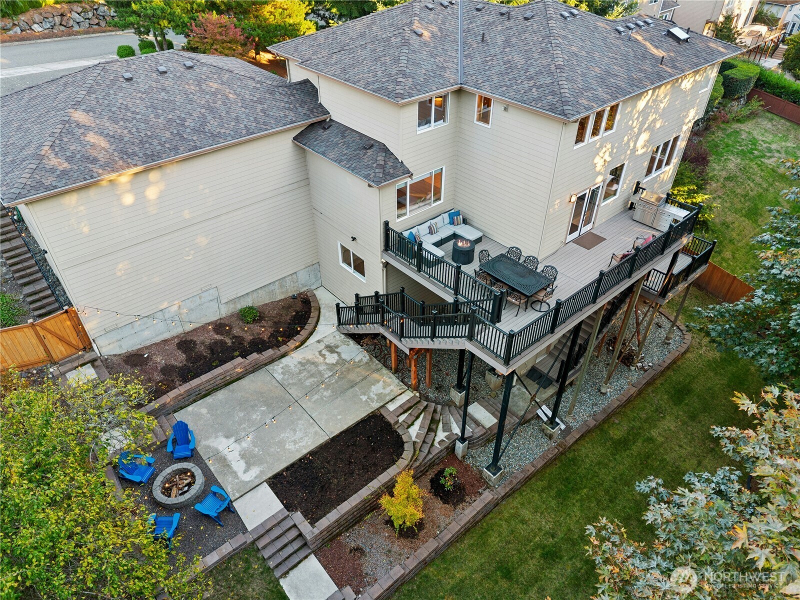 Aerial view of the back of the home and deck