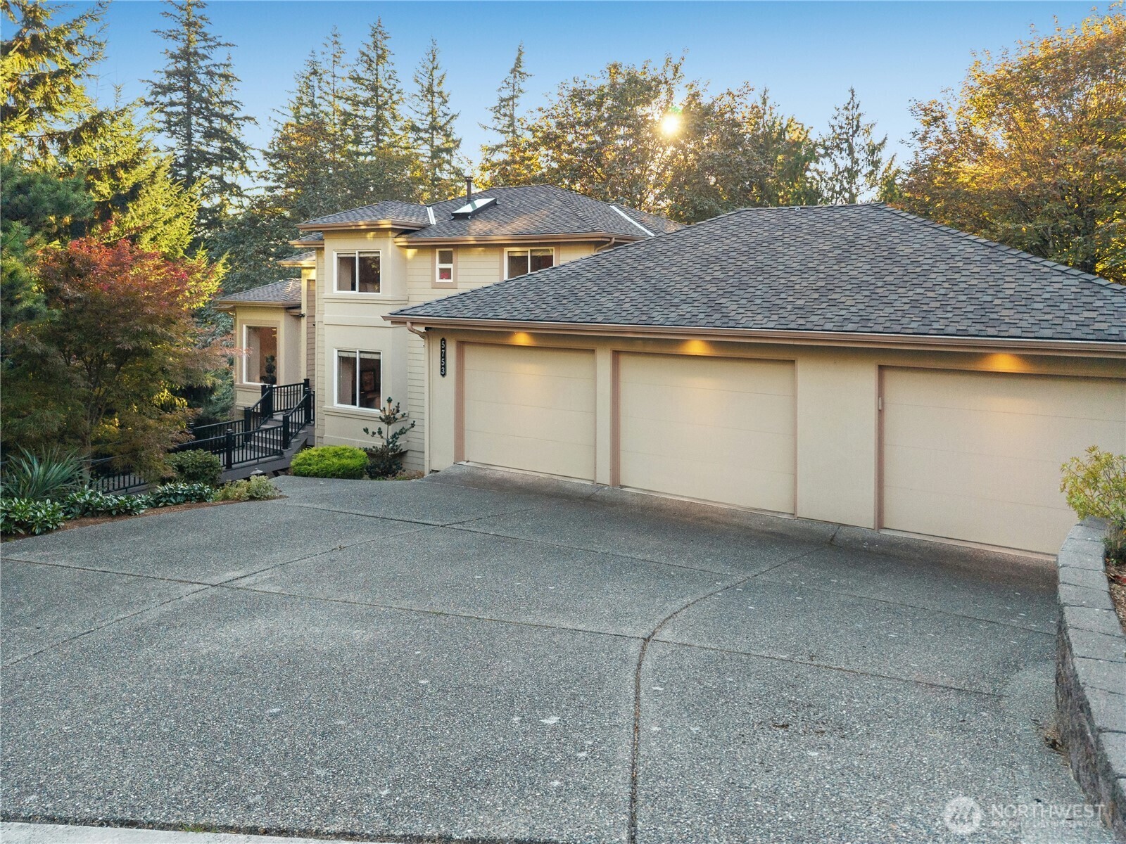 Three-car garage and driveway